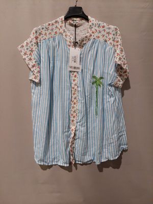 a blue and white striped shirt hanging on a hanger