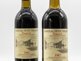 deux bouteilles de vin posées l'une à côté de l'autre sur une table