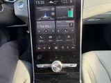 a picture of a car dashboard with a touch panel