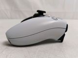a close up of a white mouse on a table