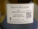 a label on a bottle of wine on a table