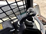 a close up of a steering control on a construction vehicle