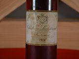 a bottle of wine that is sitting on a table