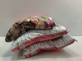 three bags of food sitting on top of each other