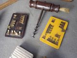 a lot of tools that are laying out on a table
