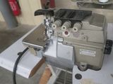 a sewing machine that is sitting on a table