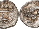 a silver coin with an image of a dragon and a lion on it