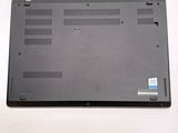 a black laptop that is sitting on a white table