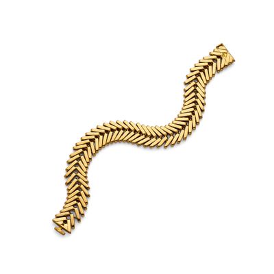 an image of a gold bracelet on a white background