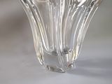 a glass bowl that is sitting on a table