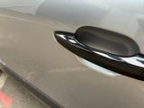 a close up of a door handle on a car