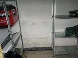 a small room with a lot of shelves in it