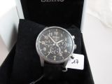 a watch that is sitting in a box on a table