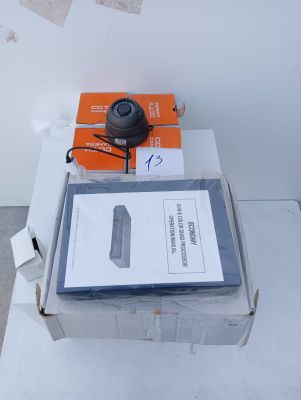 a box of electronic equipment on a white table