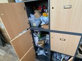 a cabinet that has a bunch of items inside of it