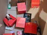 a box with many different items in it on the floor
