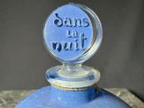 a blue bottle with the words sanss to don ' t written on it