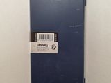 a close up of a blue case with a barcode on it