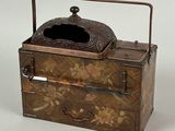 a small wooden box with a handle and a lid