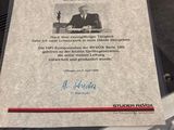 a book with a picture of a man in a suit on it