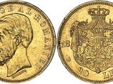 a gold sovereign coin with a crown on it