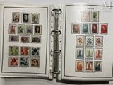 an open book with a lot of stamps on it