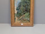 une image représentant un tableau d'un sentier dans les bois