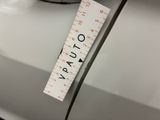 a measuring tape attached to the side of a car
