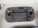 a nintendo wii game console with a remote control