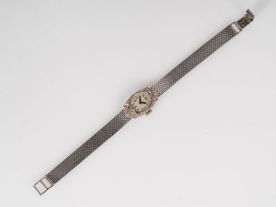 Montre de dame en platine. Cadran argenté à chiffres arabes. Boitier o - Photo 1