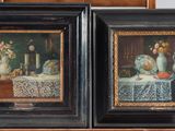 paintings of a couple of vases and a table with a table cloth on it