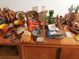 a wooden table with a lot of items on top of it