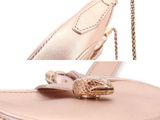 a picture of a purse that has a snake on it
