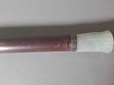 a baseball bat that is sitting on a table