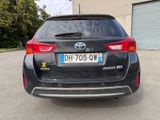 the rear end of a black toyota rav parked in a parking lot