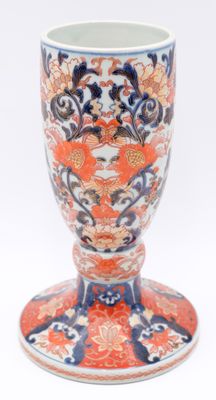 a vase with a design on it on a white background