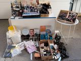 a lot of makeup and cosmetics products on the ground