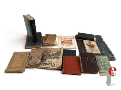 many old books that are sitting on a table