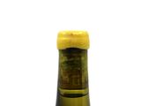 a bottle of wine that is sitting on a table