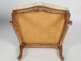 an image of a chair with a cushion on top of it