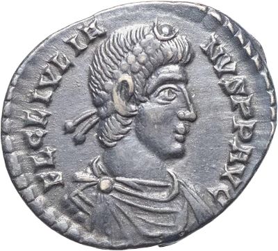 une pièce d'argent portant l'image d'un homme