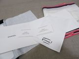 a lot of white envelopes sitting on the floor