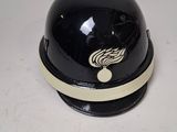 a black helmet with a white stripe on it