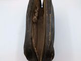a close up of a purse with a zipper on it