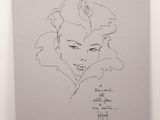 dessin représentant le visage d'une femme sur une feuille de papier, accompagné d'une citation écrite à la main