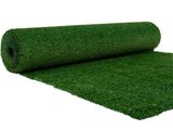 a close up of a roll of artificial grass on a white background