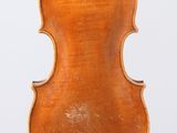 an old violin with a wooden back and bow on a white background