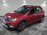 the red dacia is parked in a room with a checkered floor