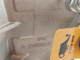 a close up of a metal object with a tag on it