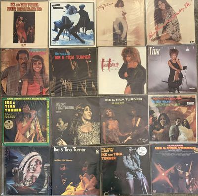 a lot of records that are on the wall